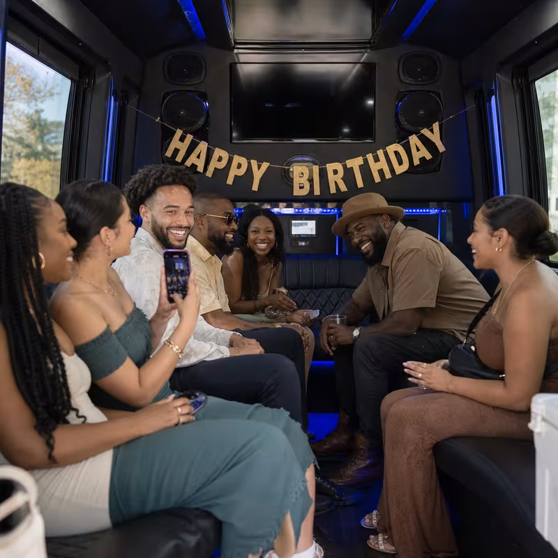 Black Mercedes Sprinter van staged for an Omaha Birthday Transportation group